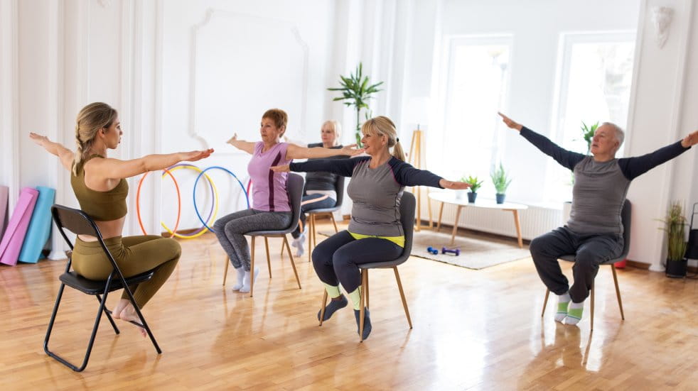 group arm stretches in chair